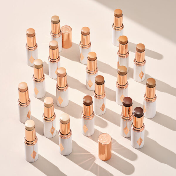 CHARLOTTE TILBURY UNREAL SKIN SHEER GLOW TINT HYDRATING FOUNDATION STICK تشارلوت كريم اساس ستك